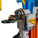 Ligne de pressage et de cerclage automatique Sorsa pour bobines de fil avec intégration de robot ABB et tête de soudage TIG.